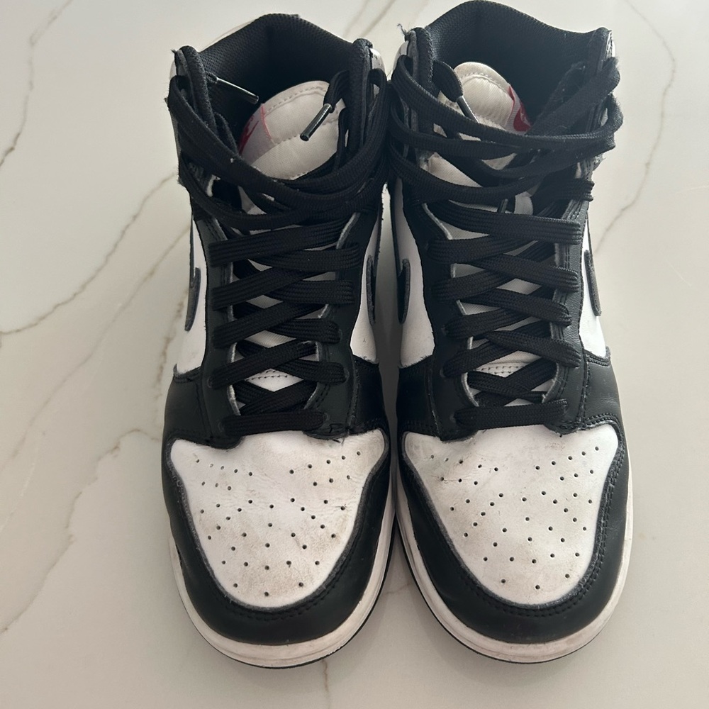 Black and white high top sneakers
